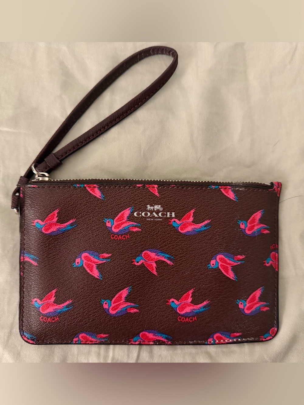 COACH Brown Leather Wristlet with Pink & Blue Bird Motif